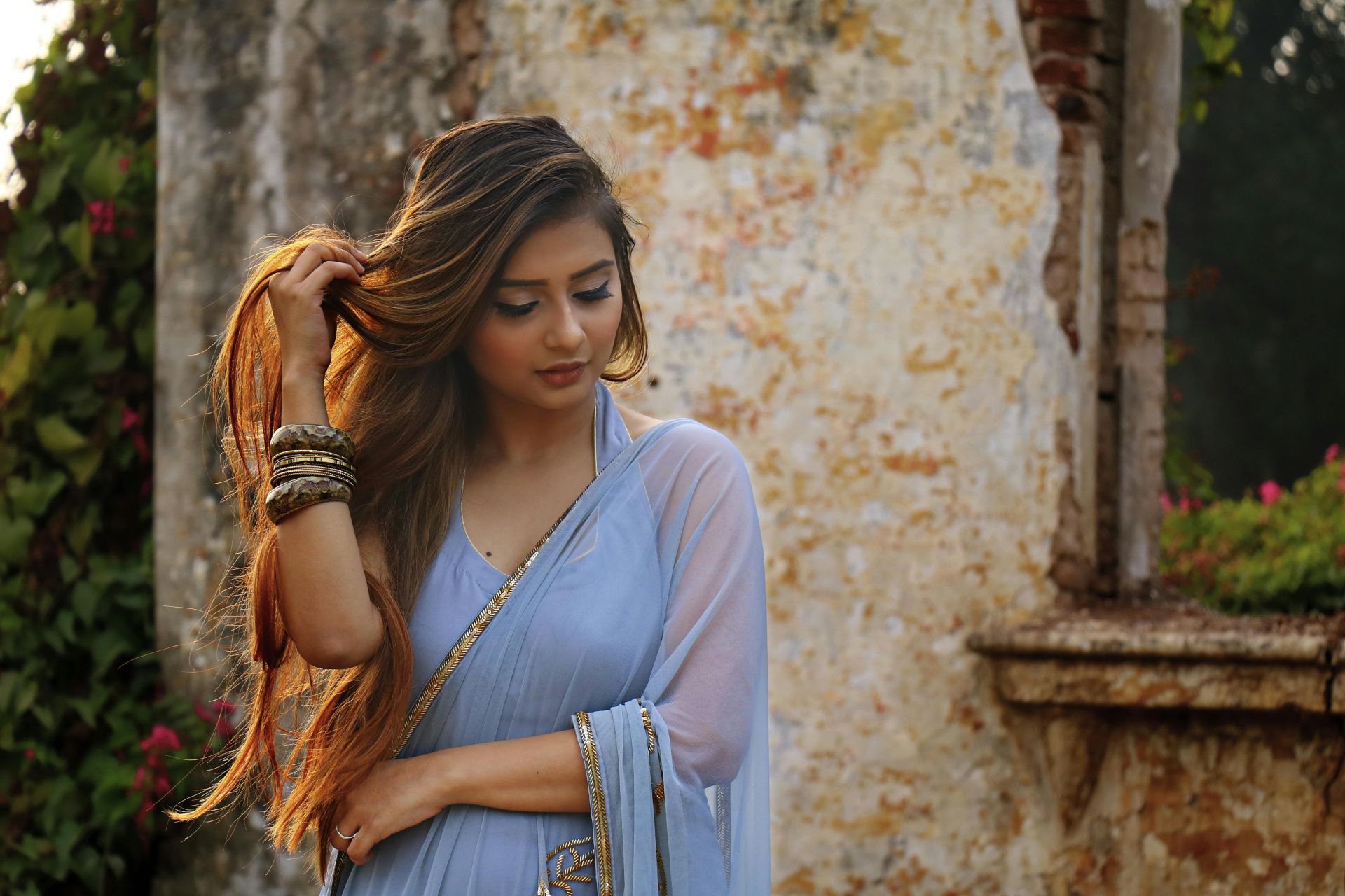 Photo of Woman Wearing Blue Dress